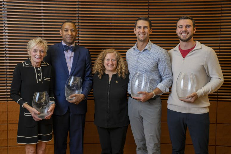 Chancellor Mnookin with the winners of the Entrepreneurial Achievement Awards. Left to right are iAnne Smith, Winslow Sargeant, Mnookin, Tyler Kennedy, and Wesley Schroll. PHOTO BY ANDY MANIS