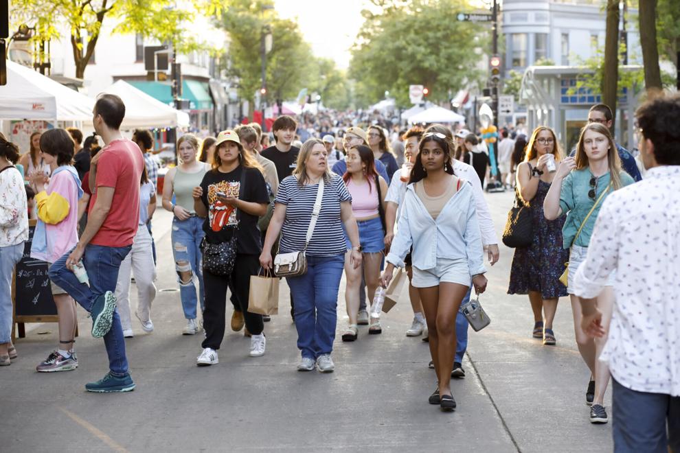 Twentysomethings are coming to Madison in large numbers for good jobs, affordability and cultural amenities like the Madison Night Market, shown above earlier this month. The trend is gaining steam, experts say.RUTHIE HAUGE