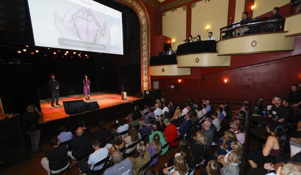 Husband-wife duo Harpreet Singh and Ravneet Kaur pitch their business, Child Health Imprints, to investors during the Greater Madison Chamber of Commerce’s annual Pressure Chamber event at Majestic Theatre on Tuesday. PHOTO: RUTHIE HAUGE